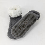 Gray socks with fleece lining. Silicone grippers on bottom for non-slip