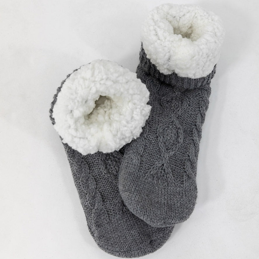 Gray socks with fleece lining. Silicone grippers on bottom for non-slip